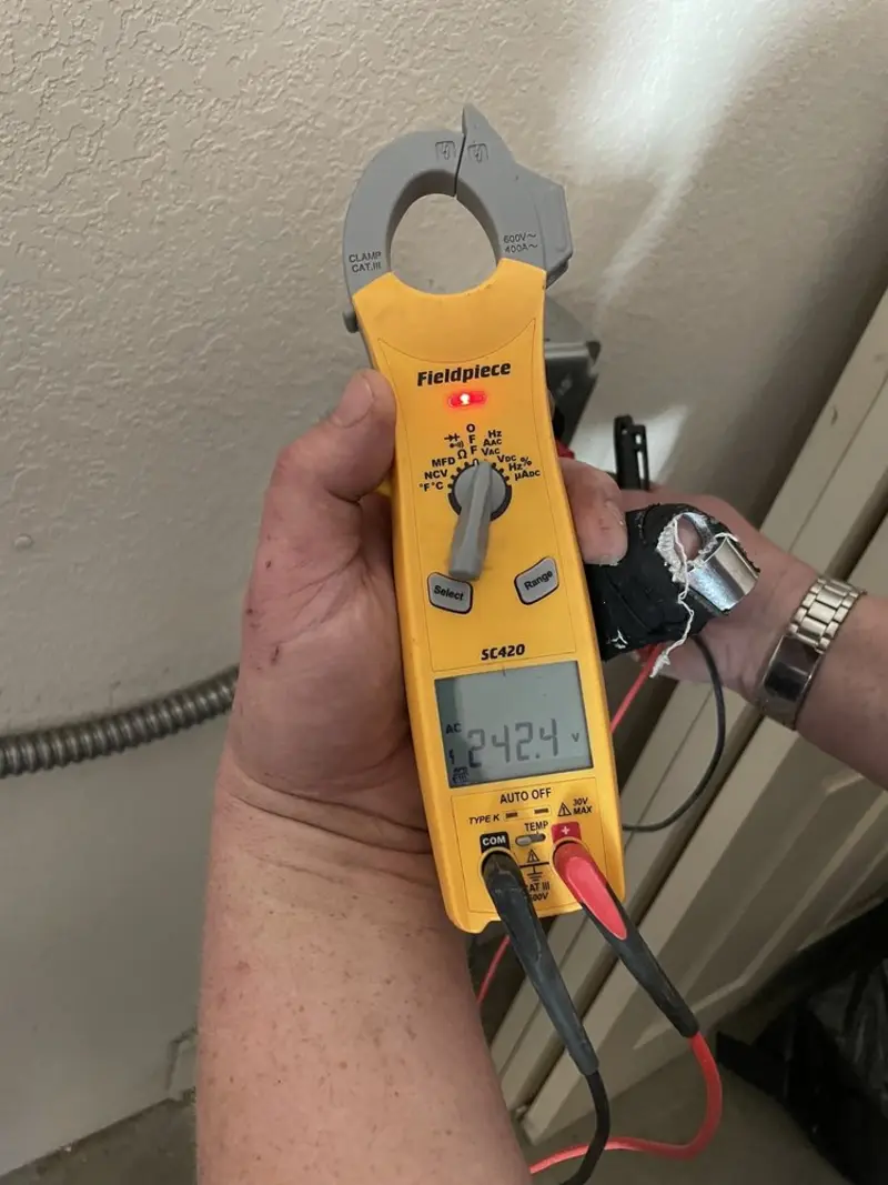 Voltage testing with clamp meter during Hot Tub / Pool Electrical Wiring in Culpeper